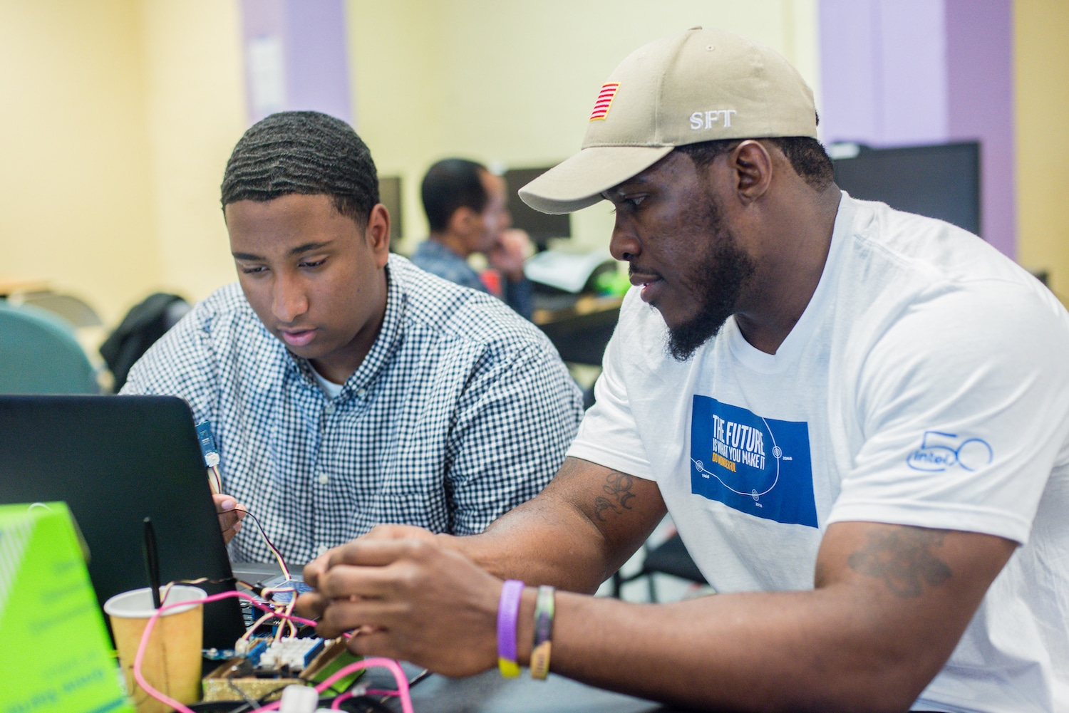 Intel employee mentor with OUSD student